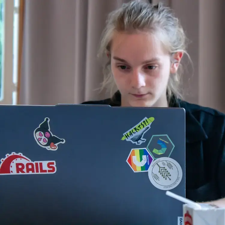 sticker hackathon laptop